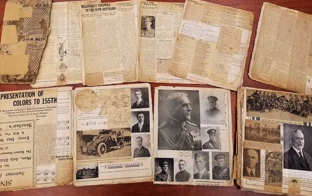 Photo of Alice Deacon's scrapbook pages from WWI.