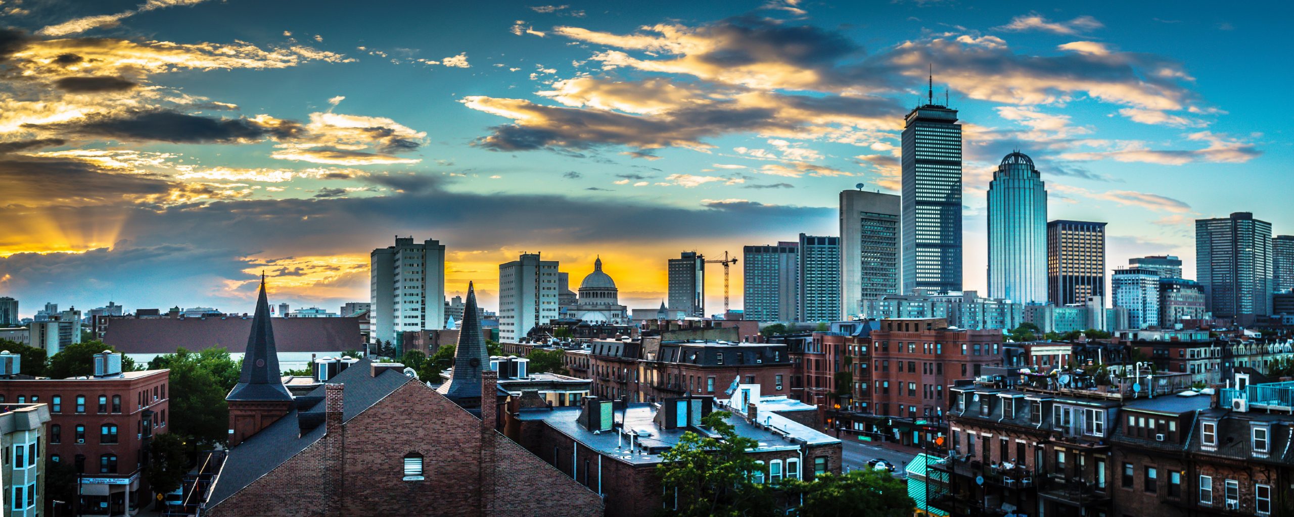 Photograph of the Boston skyline at sunset