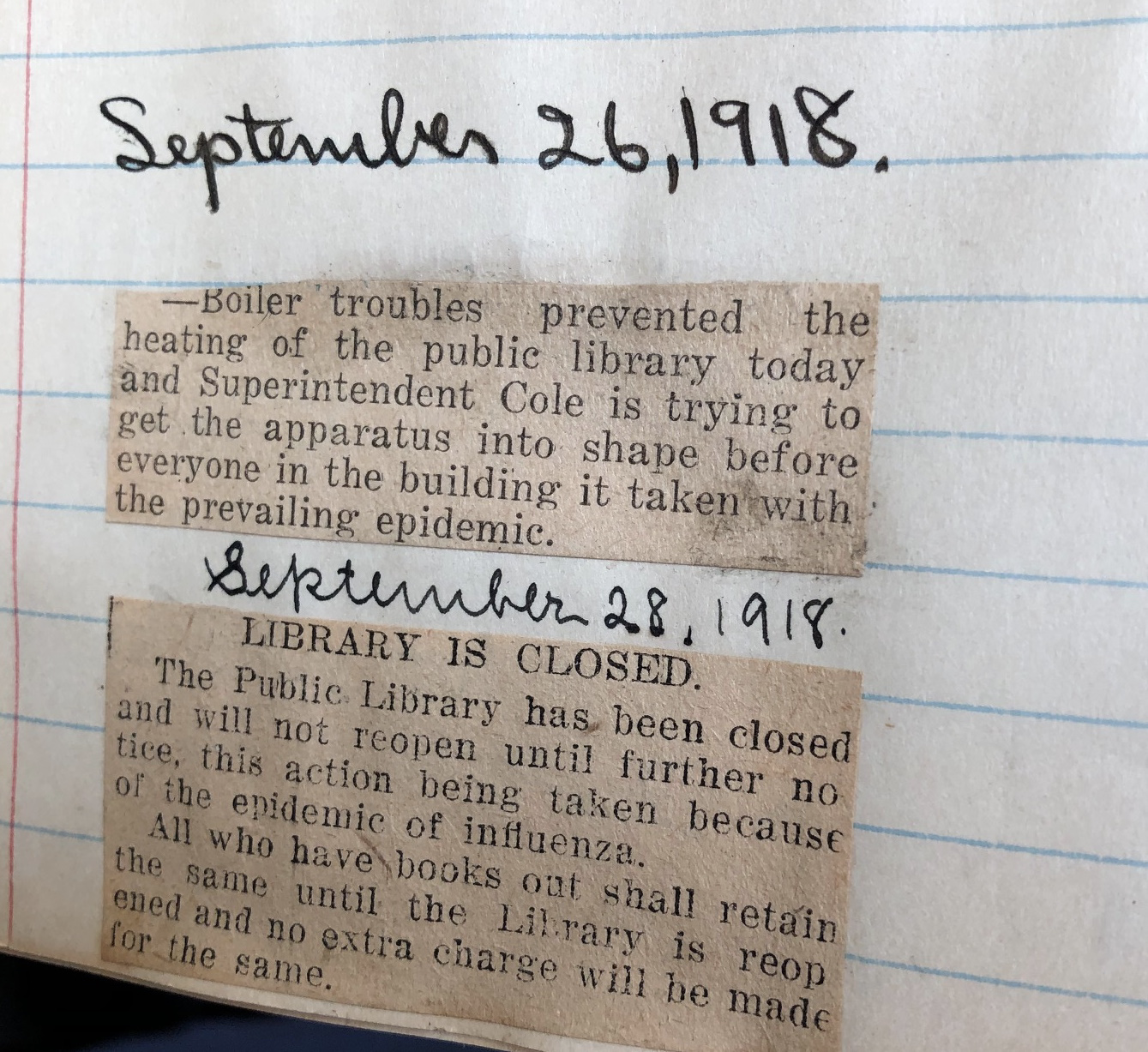Image of scrapbook page showing newspaper clippings from the early days of the 1918 flu.